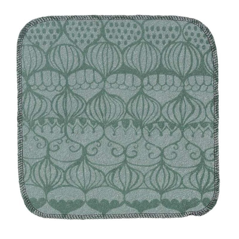 Kiertin Hamppuinen tiskirätti Sipulikupoli sävyssä Vihreä, jossa vaaleammalla murretulla mintunvihreällä pohjalla tummemman sävyisiä sipulikupoli-kuvioita.